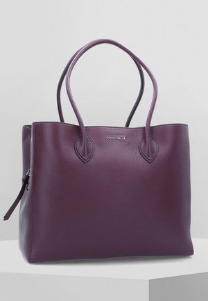 Käsilaukku - purple