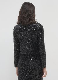Calliope COPRISPALLE CON PAILLETTES  - Camicetta - nero