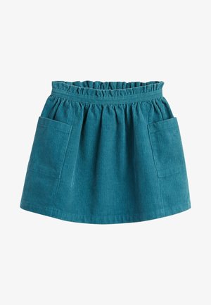 Jupe en velours côtelé bleu sarcelle avec une taille élastique froncée, dotée de deux poches avant et d'une coupe évasée, mettant en valeur une texture côtelée verticale.