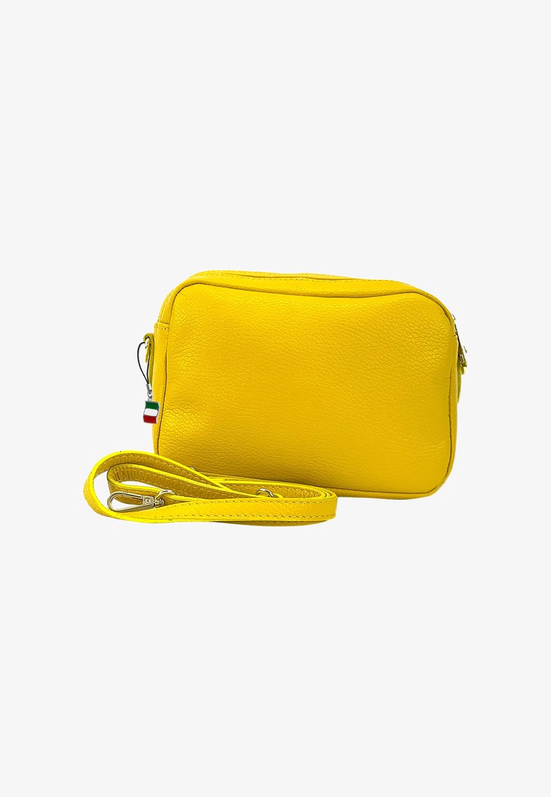 Yellow leather crossbody bag with a textured surface, rectangular shape, zip closure, and a detachable strap. Features a small tricolor accent.