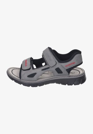 Gray men's sandal with adjustable velcro straps, textured overlays, and a cushioned insole. Features a durable black rubber outsole.