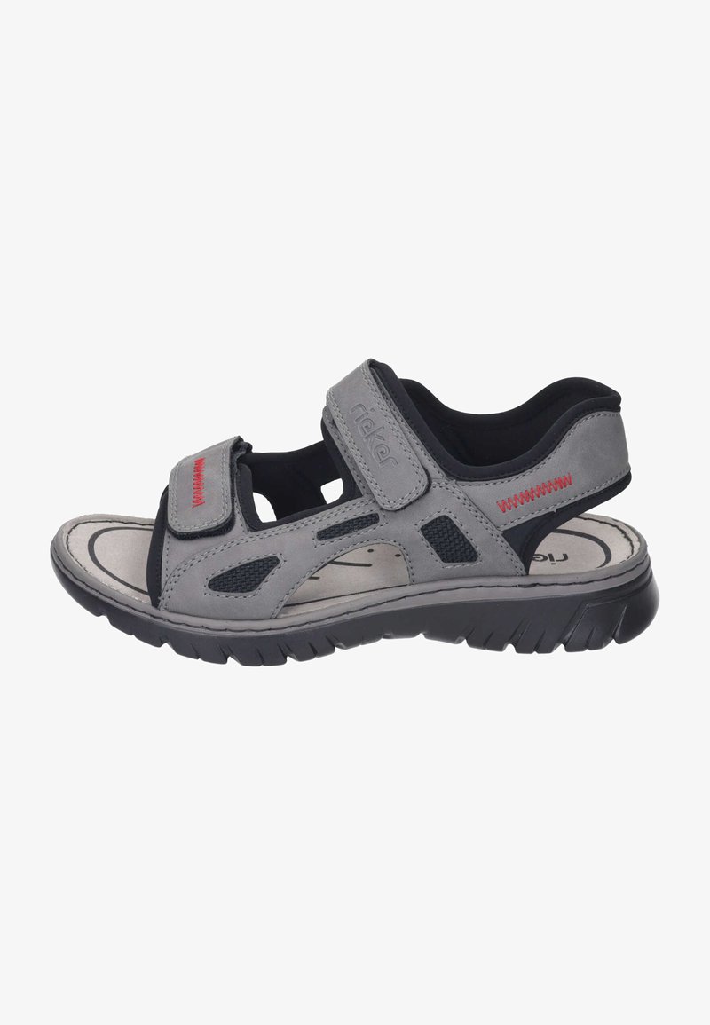 Gray men's sandal with adjustable velcro straps, textured overlays, and a cushioned insole. Features a durable black rubber outsole.