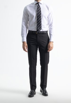 NON IRON - Pantalones - black