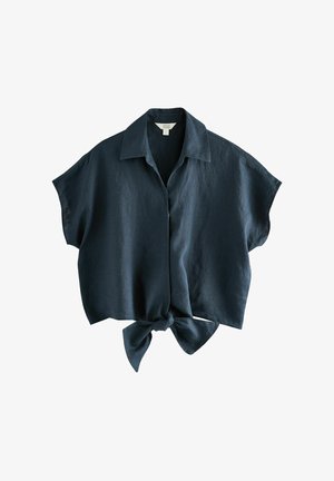 Chemise en lin bleu foncé à manches courtes avec un col et un détail de nœud à la taille ; coupe décontractée et texture lisse.