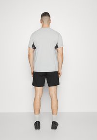 Dynafit ALPINE PRO - Lühikesed püksid (õue) - black out