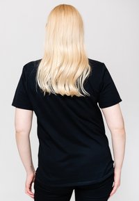 Paradiso Clothing WELCOME TO PARADISE - Print T-shirt - black