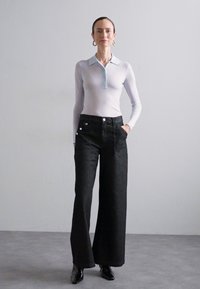 Filippa K LOOSE BUTTONED - Wide leg - washed black