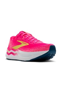 Scarpa da corsa rosa brillante con tomaia in rete, accento giallo chiaro, suola testurizzata e intersuola bianca con un design ondulato.