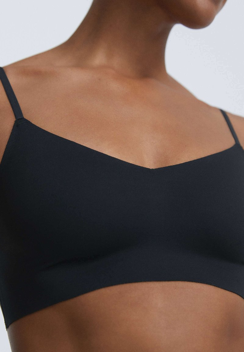Damen BHs | OYSHO INVISIBLE LASER CUT MICROFIBRE Bustier black/schwarz - RY77873 Damen BHs | OYSHO INVISIBLE LASER CUT MICROFIBRE Bustier black/schwarz - RY77873