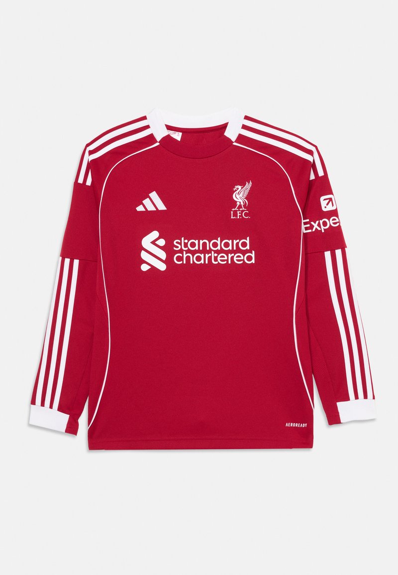 Crvena dugorukava nogometna majica s bijelim trakama, okruglog izreza, s logotipom Liverpool FC i logotipima sponzora na prednjem dijelu i rukavu.