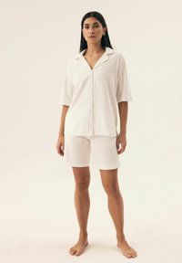 Henderson NILSA mleczny