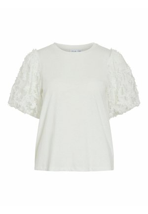 Blouse blanche à manches courtes avec encolure ronde et manches bouffantes 3D florales texturées, coupe ample, fabriquée en tissu léger.