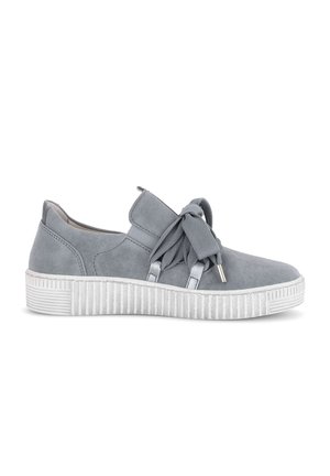Gray suede sneaker with thick white grooved sole and wide fabric laces tied in a bow on a white background.