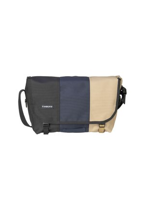 Timbuk2 Messenger-Tasche mit einem Farbschema aus Schwarz, Marineblau und Beige. Hergestellt aus strapazierfähigem Material mit verstellbarem Tragegurt und Schnallenverschluss.
