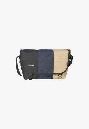 Timbuk2 Messenger-Tasche mit einem Farbschema aus Schwarz, Marineblau und Beige. Hergestellt aus strapazierfähigem Material mit verstellbarem Tragegurt und Schnallenverschluss.