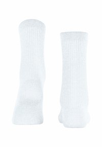 Weiße Socken aus strukturiertem Material mit vertikalem Rippendesign. Die Bündchen sind einfarbig, und das Gesamterscheinungsbild ist minimalistisch.