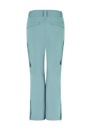 Helleblaue Hose mit glatter Textur, ausgestattet mit seitlichen Reißverschlusstaschen und Schlitzen an den Knöcheln. Entworfen für Komfort und Bewegungsfreiheit.