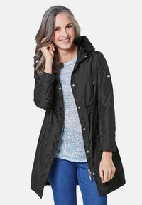 GOLDNER TRENDIGER FUNKTIONALEM - Regenjas - black