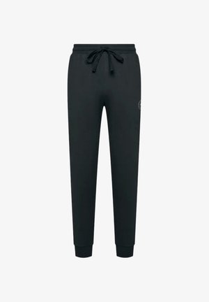 Pantalones deportivos negros de mezcla de algodón, con una cinturilla elástica con cordón, puños acanalados y un detalle de logo en el muslo izquierdo.