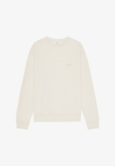 Helles beiges Sweatshirt aus Baumwolle. Verfügt über einen Rundhalsausschnitt, lange Ärmel und ein kleines gesticktes Logo auf der Brust. Weicher Stoff.