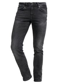 Jeans ajustados negros de denim, con cierre de cremallera, passadores para cinturón y un ligero desgastado. Incluye cinco bolsillos y detalles de costura mínimos.