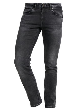 Jeans slim fit neri in denim, con chiusura a zip, passanti per cintura e leggere sfumature. Comprendono cinque tasche e dettagli di cucitura minimi.