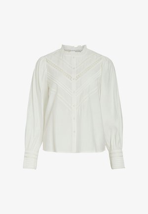 White long-sleeve blouse with a high collar, featuring pleated details and lace accents on the front and cuffs. Button-down closure at front.