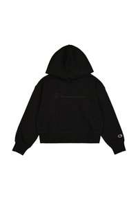 Haut à capuche noir court en tissu doux, avec une capuche à cordon, des poches avant et un logo "Champion" brodé sur la poitrine.