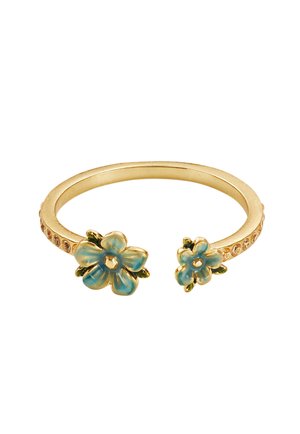 Gold open-ended ring with small blue enamel flowers on each end and small embedded crystals along the band.