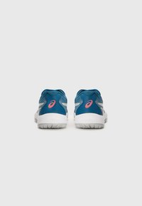 Blue athletic shoes with white soles, mesh upper, and pink logo accents. Features a rounded toe and textured, cushioned heel.