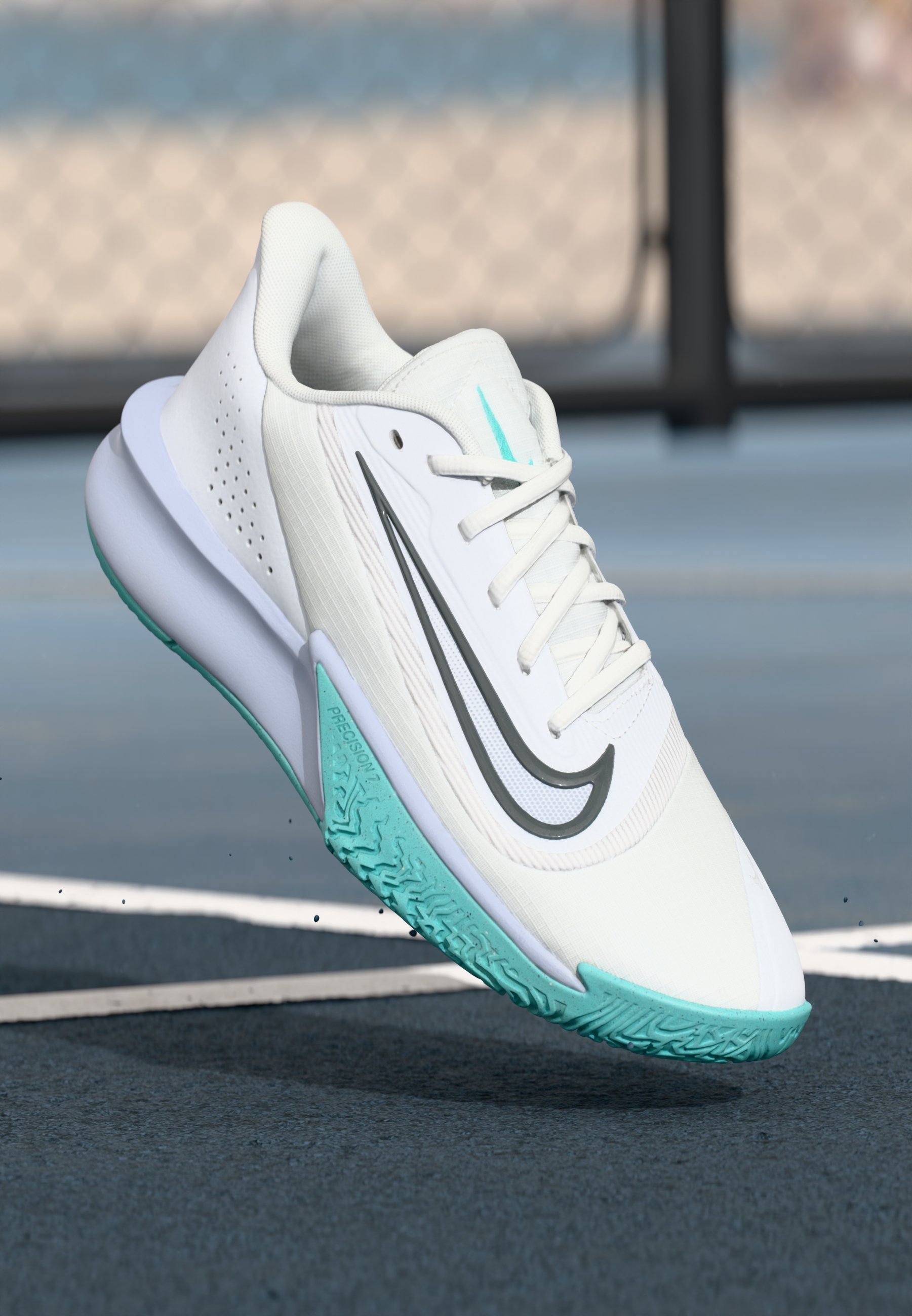 white nike shoes with teal swoosh