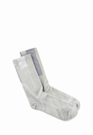 Light gray crew socks with subtle geometric patterns and ribbed cuffs laid flat on a white background.