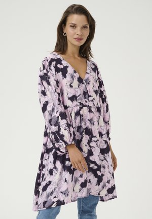 Floral dress in purple, pink, and black. Features a V-neck, long puffed sleeves, and a gathered waist. Soft fabric with a flowing design.