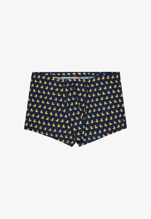 Boxer blu navy con un motivo completo di piccoli paperelle gialle di gomma, alcune con fiocchi rossi, distesi in piano.