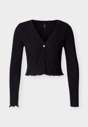 Black ribbed cardigan with long sleeves, V-neck, scalloped hem, and single white button closure at the front. Soft texture.