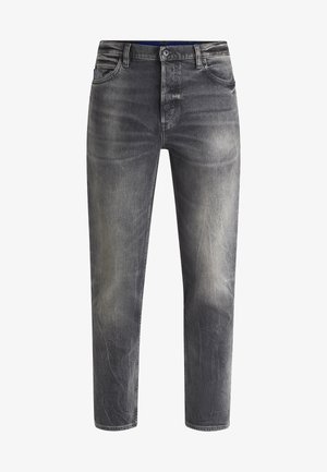 Graue Denim-Jeans mit einem abgenutzten Textil, geradem Schnitt, fünf Taschen und einem Gürtelschlaufe. Leicht beschädigter Look an den Knien.