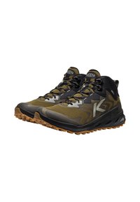 Men's hiking shoes featuring a black and olive green mesh upper, rubber sole, reinforced toe, and textured lacing system for secure fit.