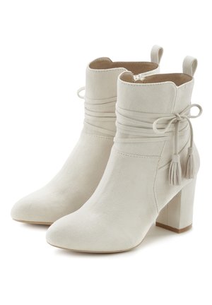 High heeled ankle boots - beige