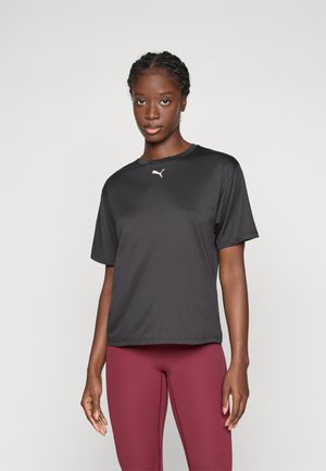 Black short-sleeve athletic shirt made of smooth, lightweight fabric, featuring a white Puma logo on the chest. Paired with form-fitting maroon leggings.