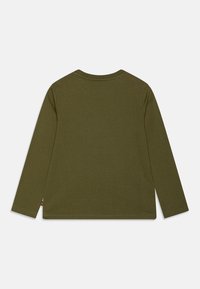 Long-sleeve shirt in olive green, made from soft cotton. Features a round neckline and simple construction with no visible patterns or accents.