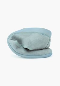 Gray suede slipper with a rounded shape, smooth texture, and flexible sole. Features a low profile and soft folded design.