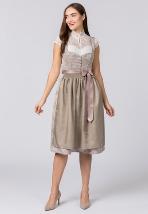 Midi-Kleid mit Spitzenkragen, strukturiertem beigen Rock, satinierter Taillenschnürung und pinken Knopfakzenten am Oberteil.