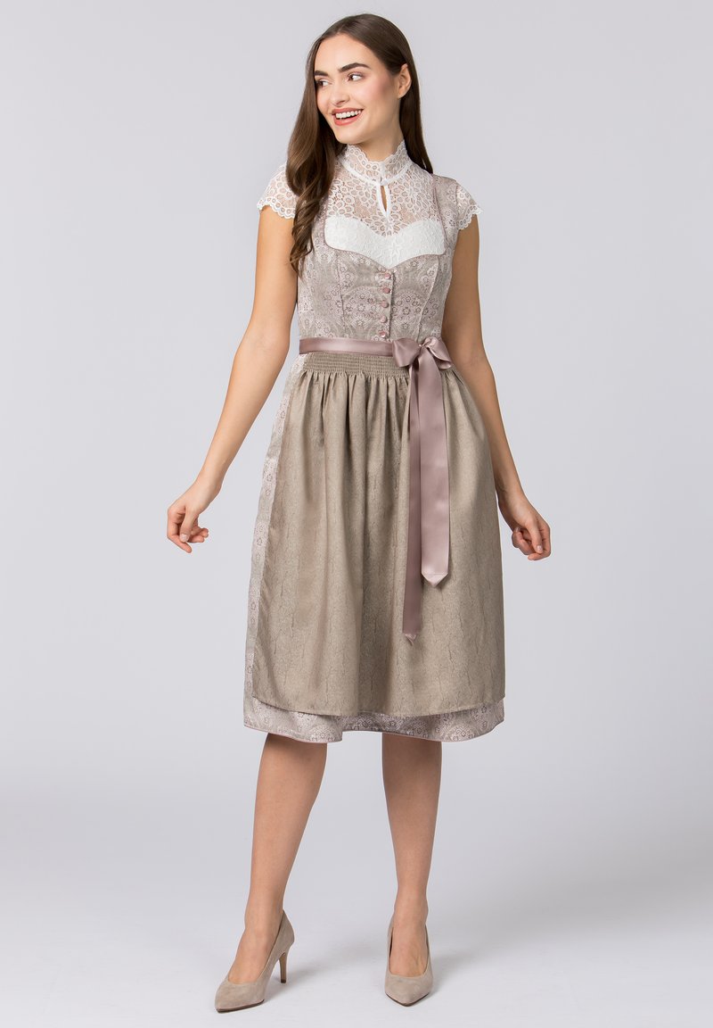 Lace-collared midi dress with a textured beige skirt, satin ribbon waist tie, and pink button accents on the bodice.