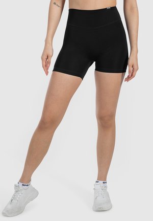 Zwarte high-waisted shorts van rekbaar materiaal. Gladde textuur, eenvoudig ontwerp, midden-dij lengte en geen zichtbare patronen of hardware.