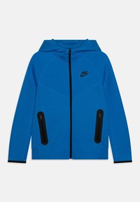 Blå Nike dragkedjehoodie med huva, svarta dragkedjor p�å två framfickor och svart kant runt dragkedjan och muddarna.