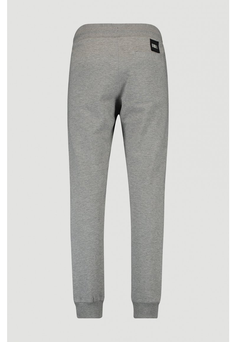 Pantaloni grigi in felpa con una texture morbida, cintura elastica e polsini a costine, con un piccolo etichetta del marchio sul retro.