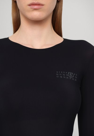 Black fitted long-sleeve top with a smooth texture and rounded neckline, featuring a small numerical graphic in gray on the left side.