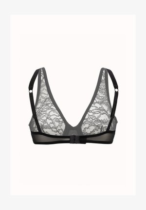 Bralette in pizzo nero con scollatura a V profonda, schiena in rete trasparente e spalline regolabili con chiusura a gancio. Motivo dettagliato in pizzo floreale.