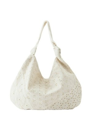 Sac à épaule en tissu couleur crème avec broderie florale à œillets et une seule bandoulière souple.