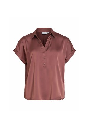 Chemise mauve soyeuse à manches courtes avec col et trois boutons sur le devant, coupe ample, manches retroussées.
